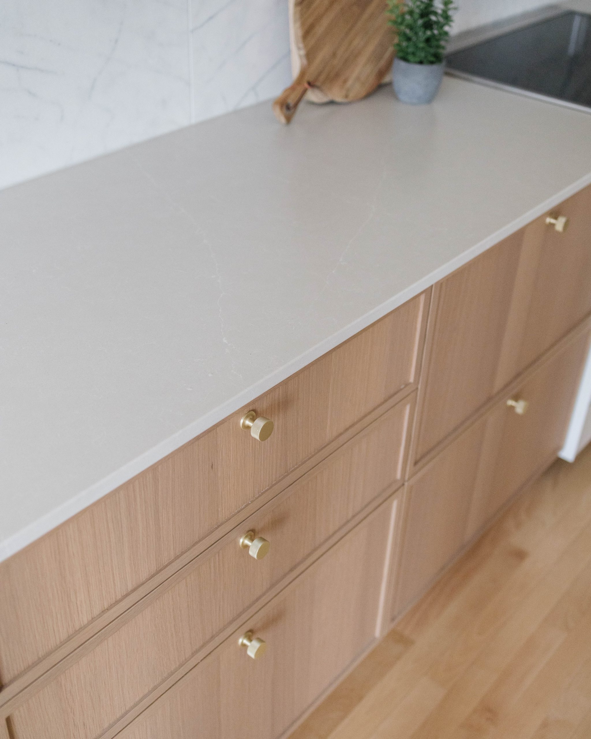 Oak drawer fronts with brass pulls, De Lorimier kitchen